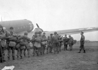 Paratroopers of the 82nd Airborne Division assemble next to the transport planes that will be taking them to Holland. Date is 17 September 1944. (National Archives)